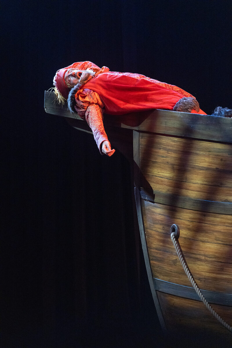 Fraser performing on stage